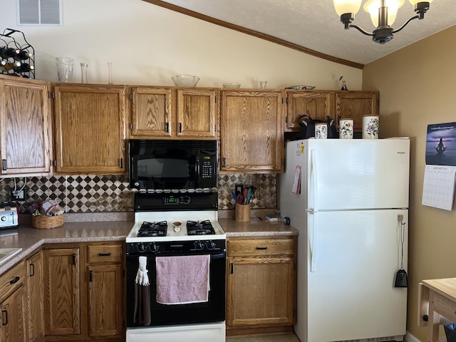 kitchen with lofted ceiling, an inviting chandelier, black appliances, a textured ceiling, and decorative backsplash