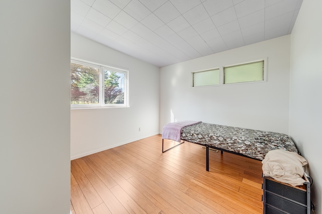 bedroom featuring hardwood / wood-style floors