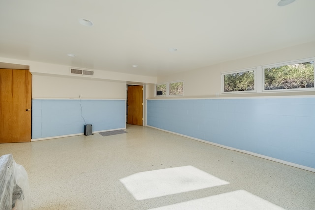 unfurnished room with a wealth of natural light