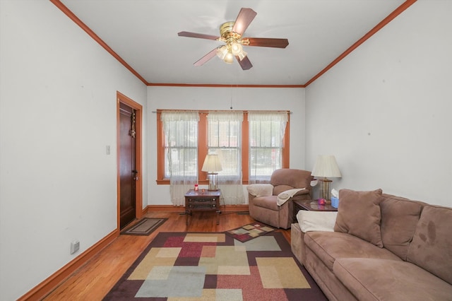 unfurnished living room featuring crown molding, light wood-type flooring, and ceiling fan