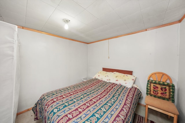 bedroom with ornamental molding