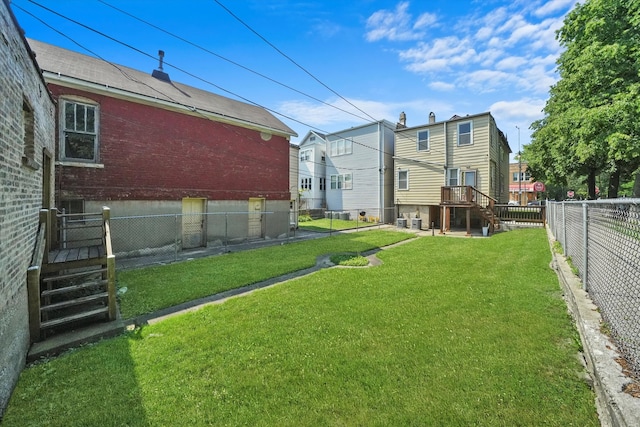 view of yard featuring a wooden deck