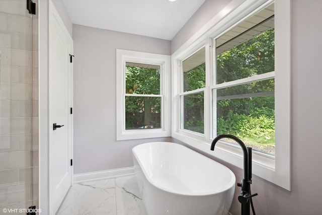 bathroom featuring a tub