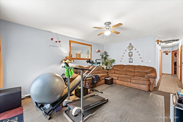 exercise room featuring carpet floors and ceiling fan