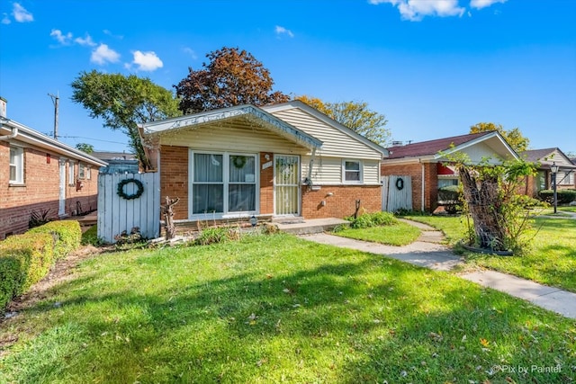 bungalow with a front yard