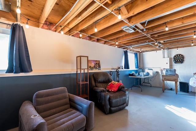 living area featuring concrete flooring