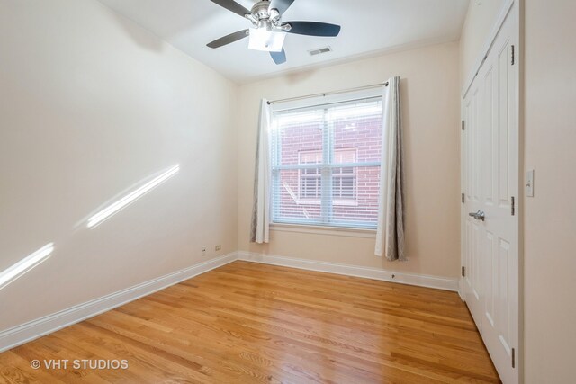 unfurnished room featuring ceiling fan and light hardwood / wood-style flooring