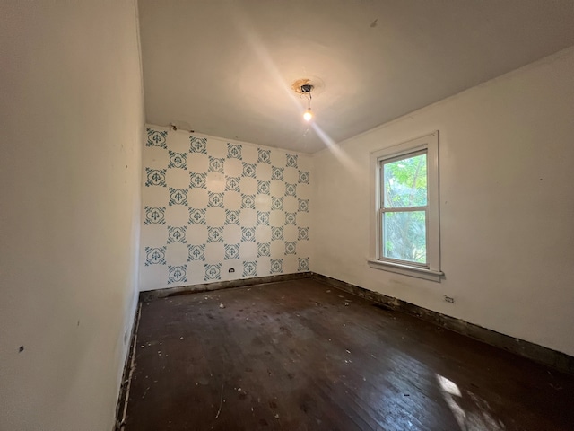 bonus room featuring dark hardwood / wood-style flooring