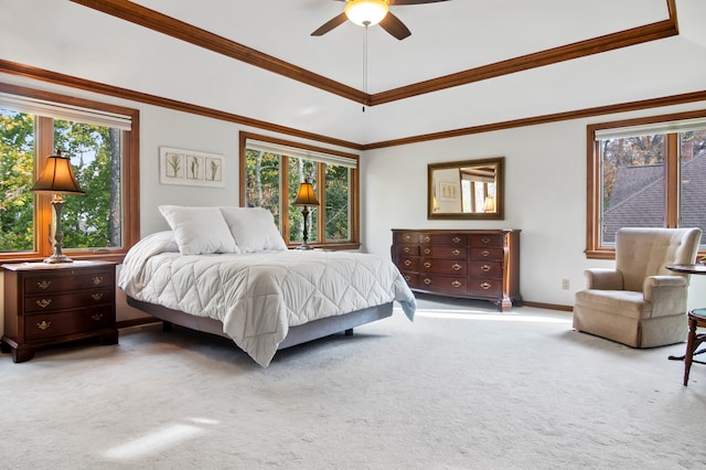 carpeted bedroom with ceiling fan and crown molding