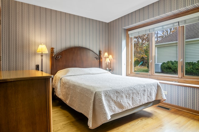 bedroom featuring light wood-type flooring