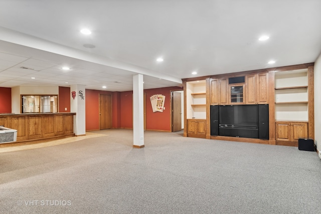 unfurnished living room featuring light colored carpet