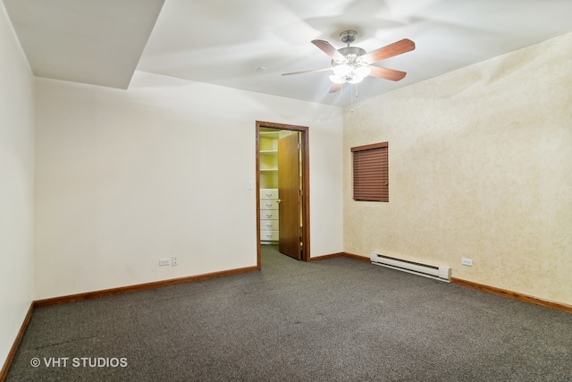 carpeted empty room with baseboard heating and ceiling fan