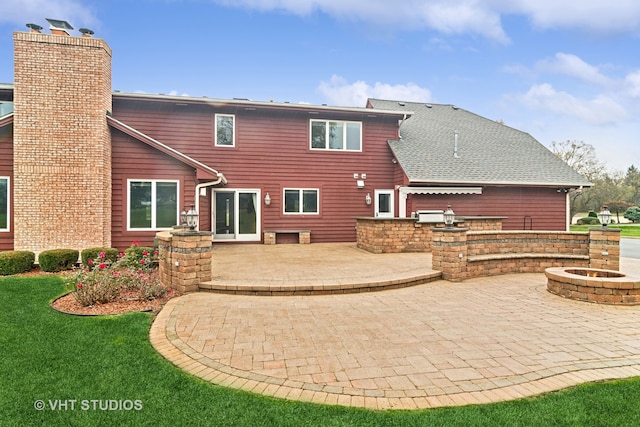 back of house featuring a patio