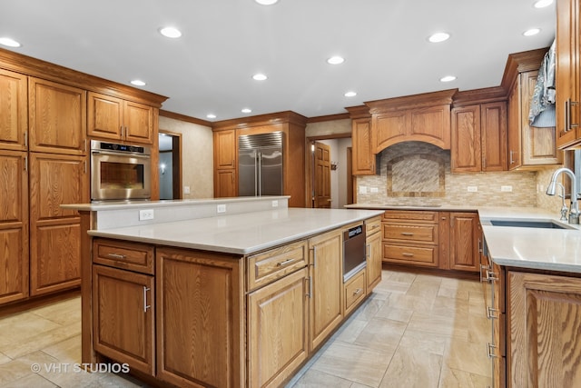 kitchen featuring tasteful backsplash, ornamental molding, stainless steel appliances, sink, and a kitchen island