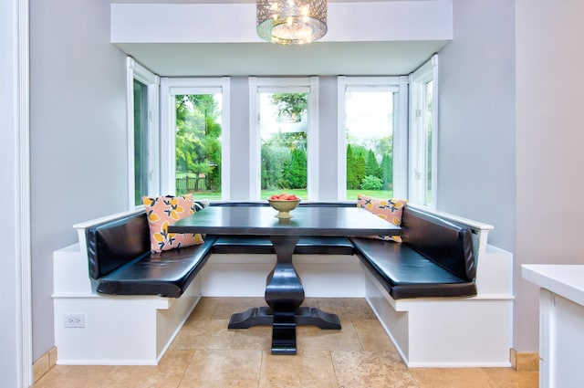 dining room with plenty of natural light and breakfast area