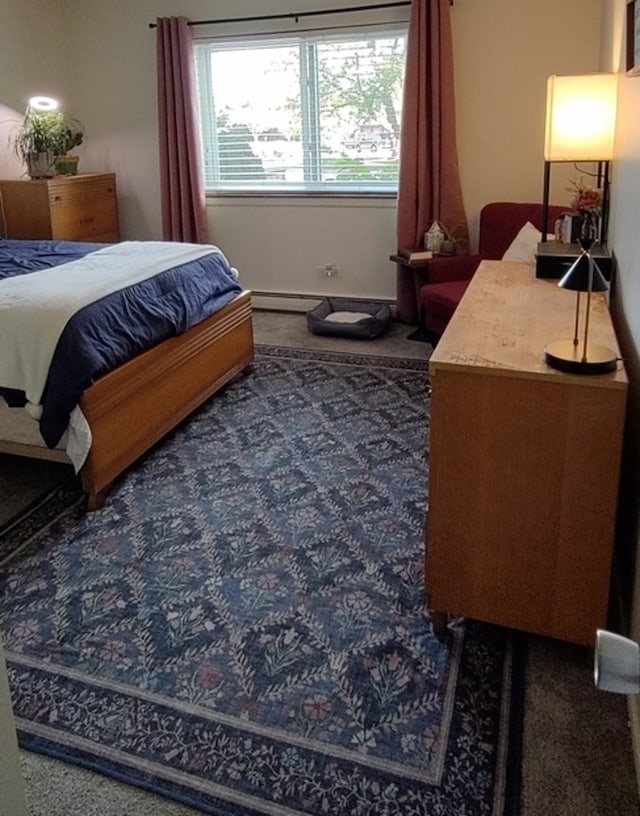 bedroom featuring dark carpet