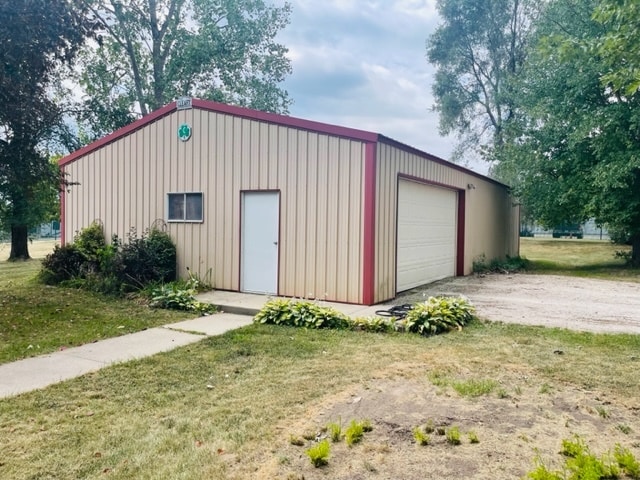 garage featuring a yard