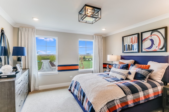 carpeted bedroom with crown molding and multiple windows