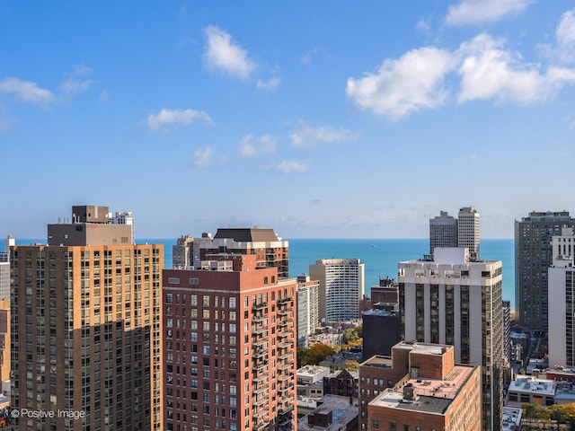 property's view of city with a water view