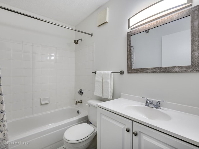 full bathroom with toilet, a textured ceiling, vanity, and shower / bath combination with curtain