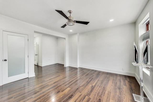 interior space featuring dark hardwood / wood-style floors and ceiling fan