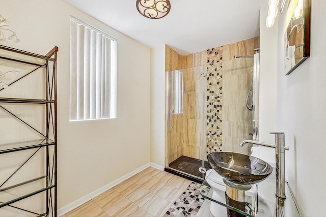 bathroom with tile patterned flooring, toilet, and an enclosed shower