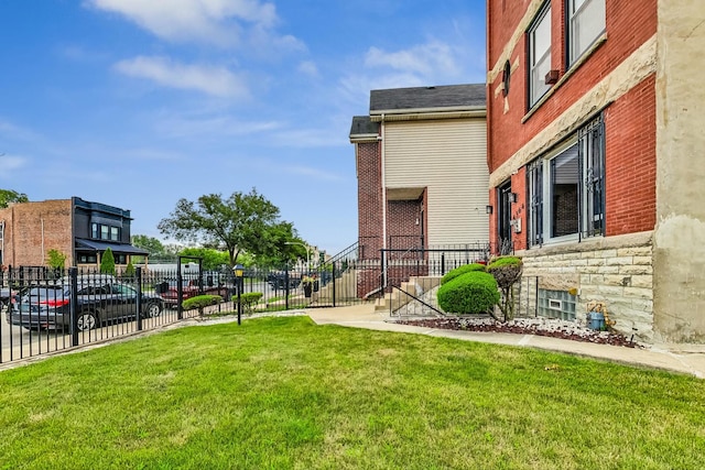 view of property's community with a yard