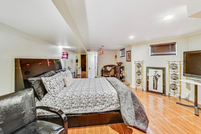 bedroom with hardwood / wood-style floors