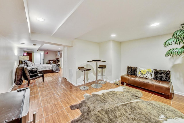 sitting room with hardwood / wood-style flooring