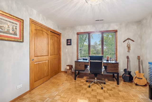 home office with light parquet floors