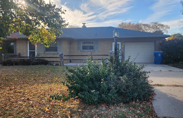 single story home with a garage