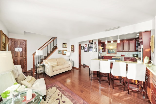 living room featuring dark hardwood / wood-style floors