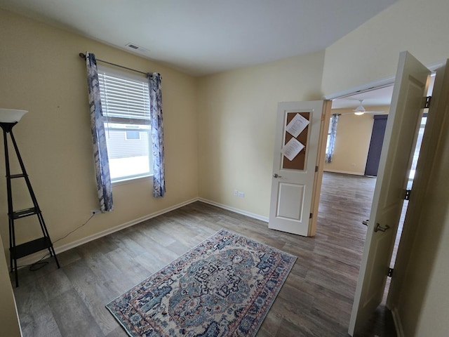 unfurnished room featuring hardwood / wood-style floors