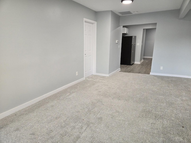 1007 River Rd, Mchenry, IL 60050 - carpeted empty room with baseboards and visible vents