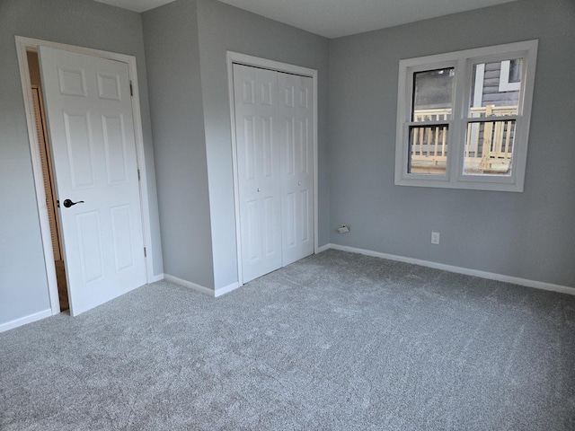 1007 River Rd, Mchenry, IL 60050 - unfurnished bedroom with carpet floors, baseboards, and a closet