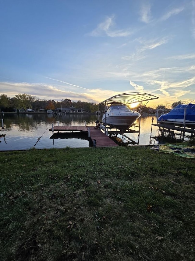 1007 River Rd, Mchenry, IL 60050 - view of dock with a lawn, boat lift, and a water view
