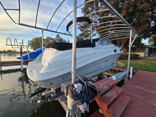 view of dock with a water view