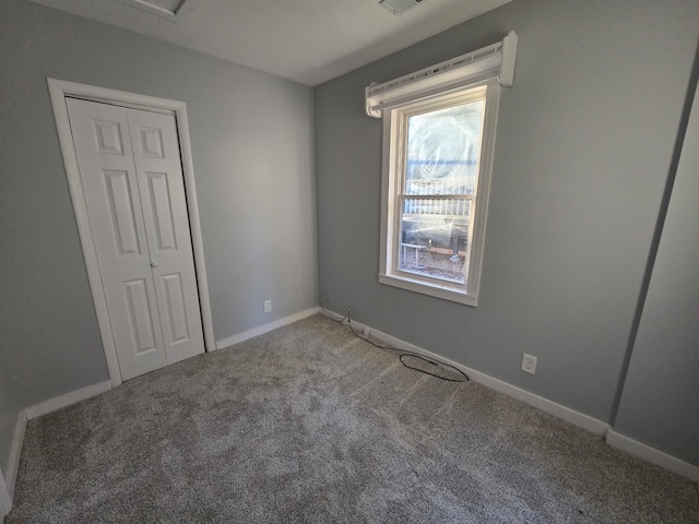 view of carpeted spare room