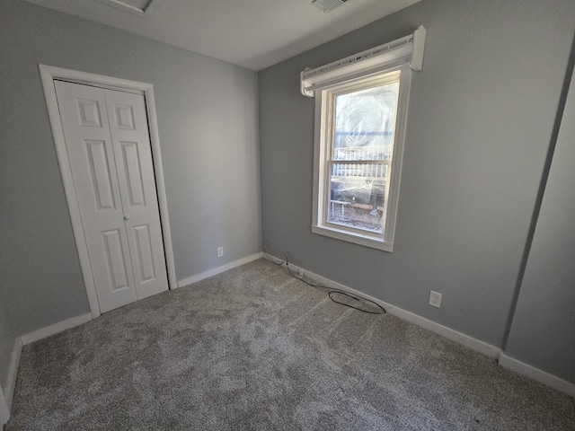 1007 River Rd, Mchenry, IL 60050 - carpeted empty room with baseboards and visible vents