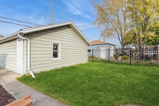 view of property exterior with a lawn