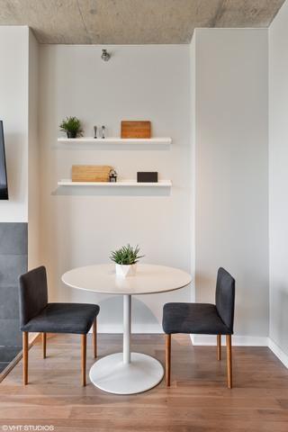 dining area featuring hardwood / wood-style flooring and breakfast area