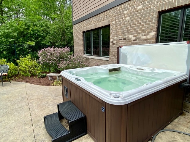 view of patio featuring a hot tub