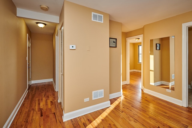 hallway featuring light wood-type flooring