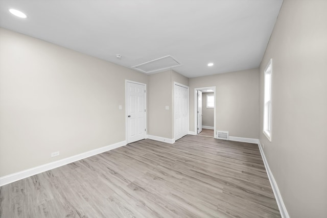 empty room featuring light hardwood / wood-style floors