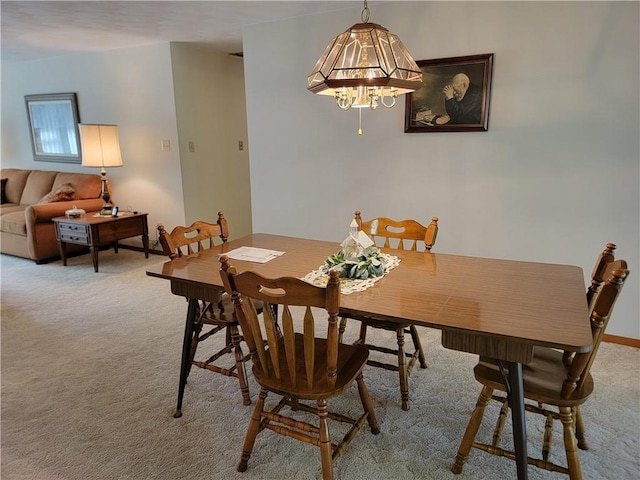 view of carpeted dining room