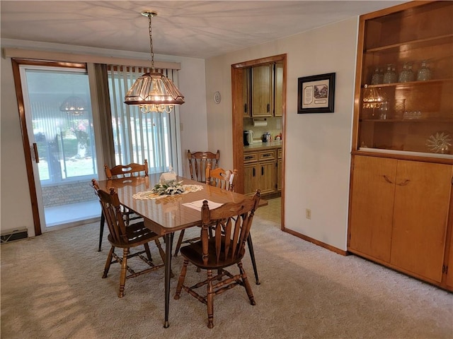 view of carpeted dining room