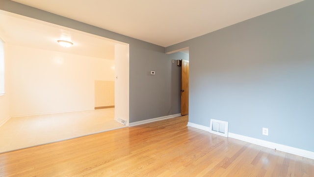 empty room featuring light hardwood / wood-style floors