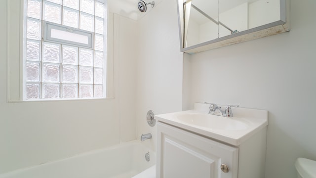 full bathroom with shower / bath combination, toilet, and vanity