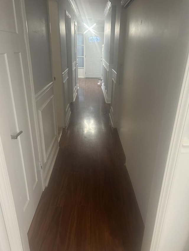 hall with dark wood-type flooring