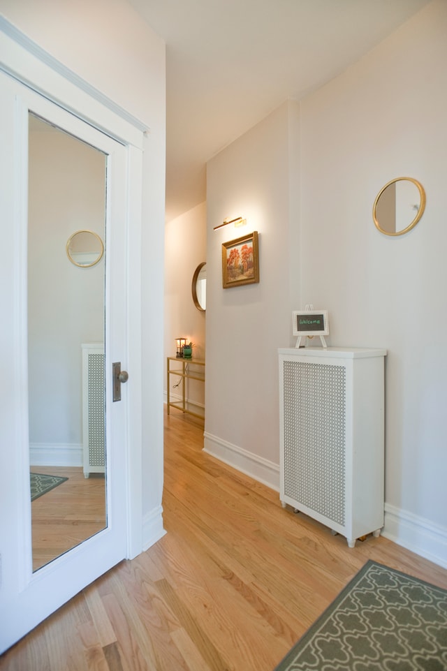 hallway featuring light hardwood / wood-style floors